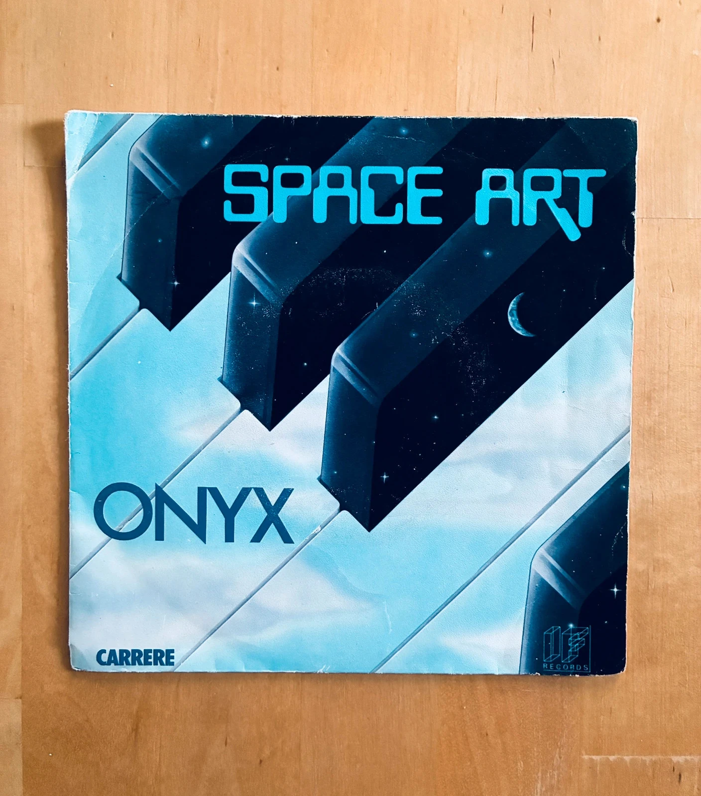 Disque vinyle 45T Space Art Onyx.